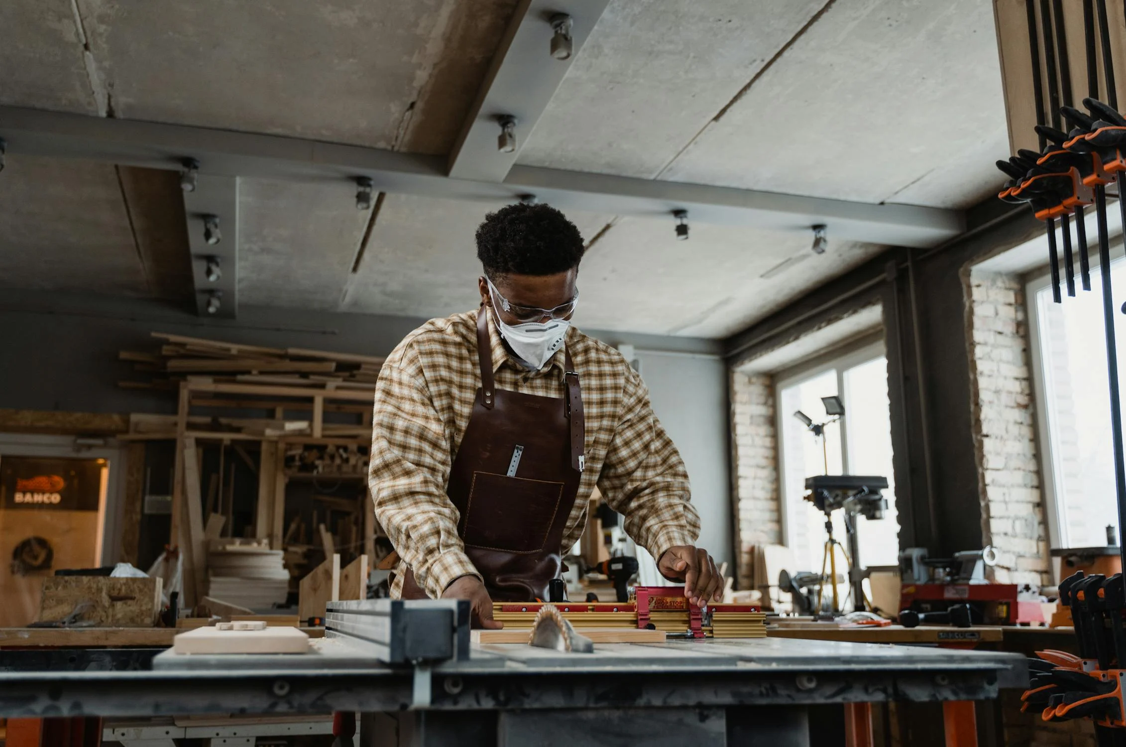 Person cutting in an industrial setting